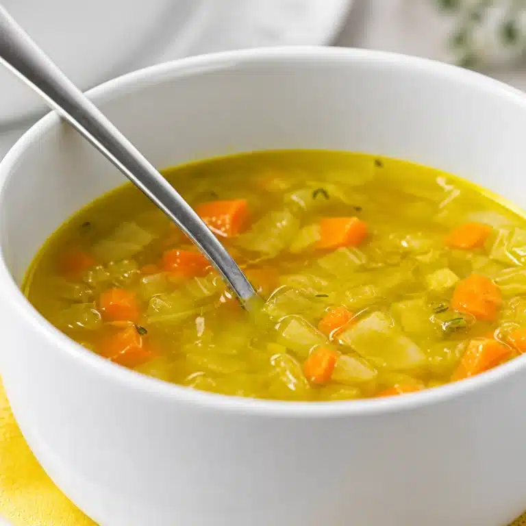 Creamy & tasty carrot soup served as a perfect appetizer in a bowl.